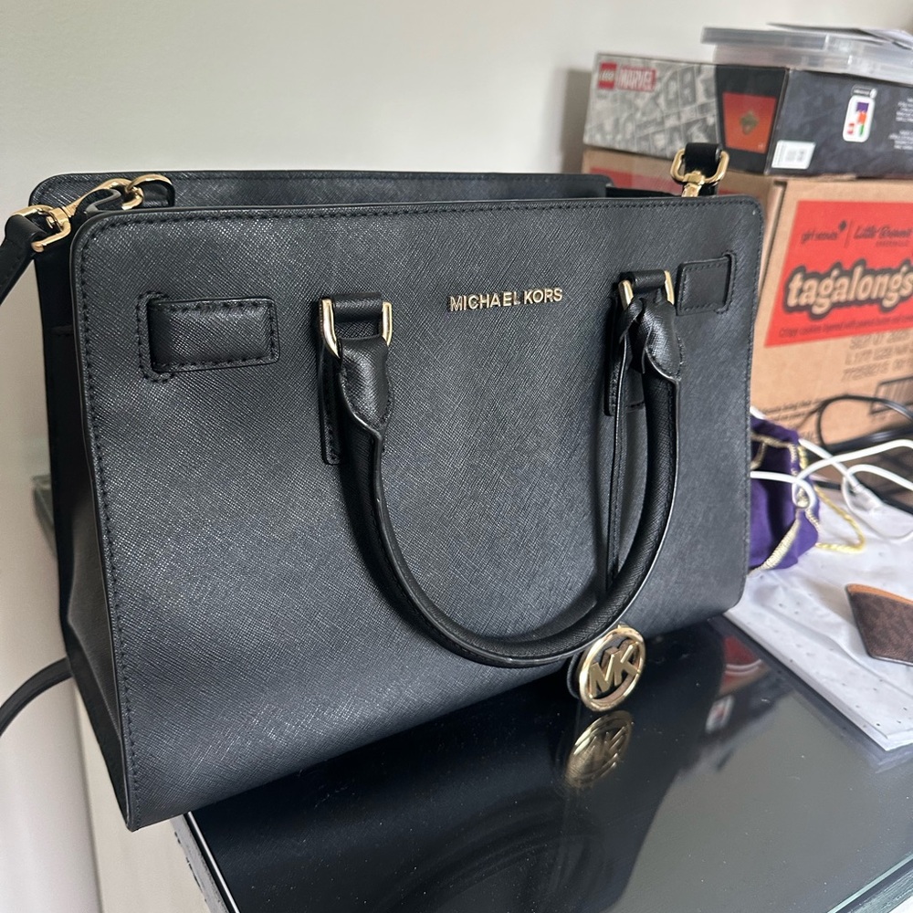 Michael Kors Black Satchel with Structured Silhouette and Metal Accents